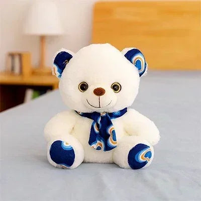 Ours en peluche bleu posé sur la table