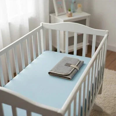 Tapis à langer nomade pliable