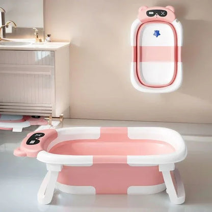 Baignoire bébé rose et pliable avec thermomètre