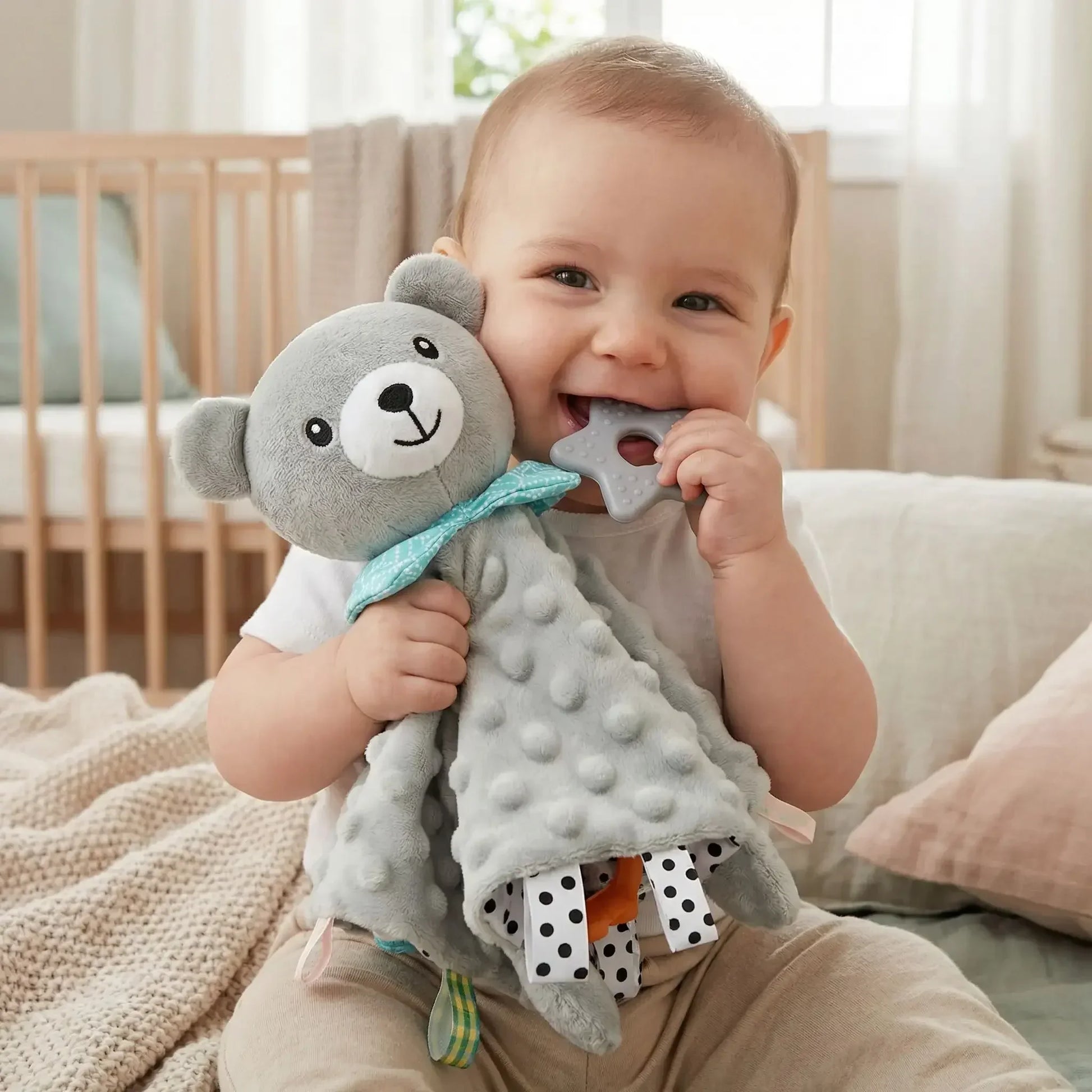 doudou-ourson-gris-anneau-dentition