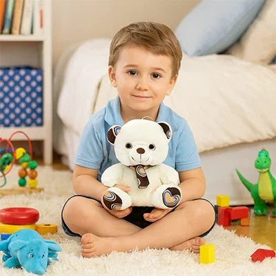 Ours en peluche brun avec petit garcon