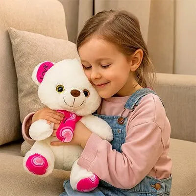 Ours en peluche rose qui fait un calin a une petite fille