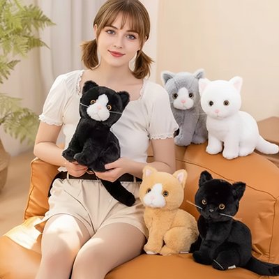 Peluche chat noir avec enfant