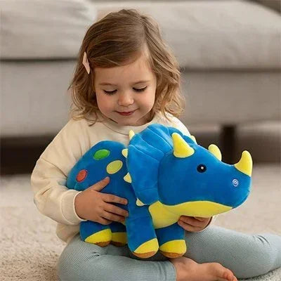 Peluche dinosaure bleu avec petite fille