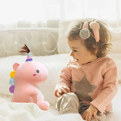 Peluche dinosaure rose avec petite fille