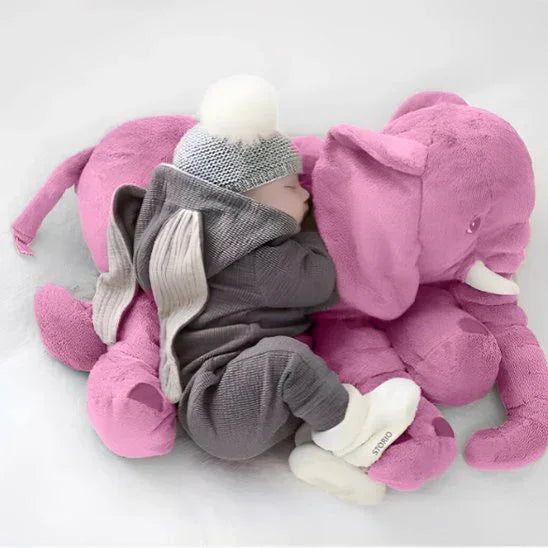 peluche elephant mauve avec bébé couché dessus