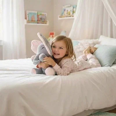 Peluche interactive doudou éléphant rose