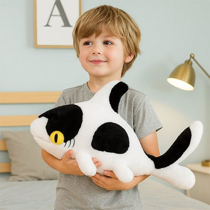 Peluche requin blanc et noir avec bébé qui joue